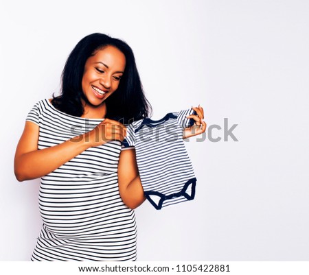 young pretty african american woman pregnant happy smiling, posi