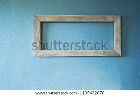 picture frame on the walls of the house are made of cement. natural pattern for beautiful wallpapers. Suitable for use an luxurious background. Vintage tone