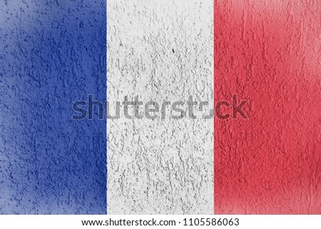 Texture of the France flag on a white wall of plaster.