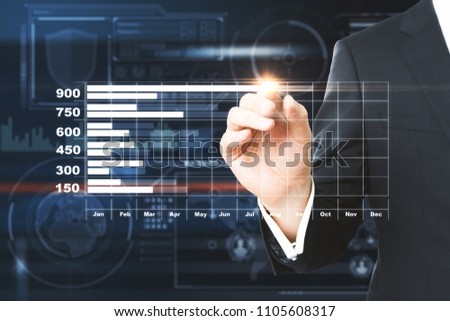 Hand drawing creative business chart on blurry background. Finance and stock concept