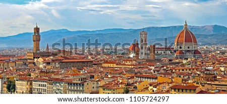 Florence Italy Panorama with Arno River Old Palace and the Big Dome of The Cathedral called Duomo di Firenze  with vivid colors