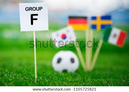 Group F - National flags of Germany, Mexico, Sweden, Korea Republic, South Korea and table with tittle "Group F"  Royalty-Free Stock Photo #1105725821