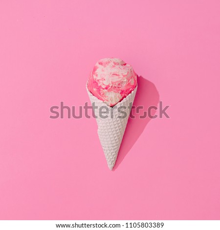 Vanilla and strawberry ice cream in white ice cream cone on pastel pink background. Summer minimalism. Flat lay.