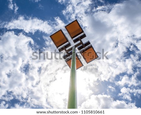 Tennis Court lighting on the sky background
