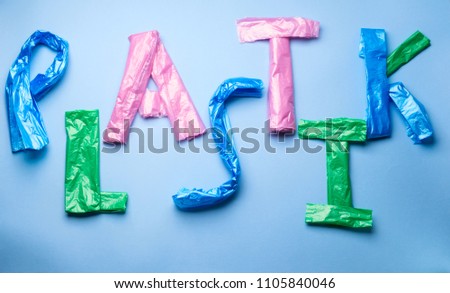 Word Plastic written with plastic bag letters on blue background