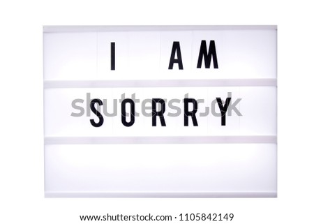I am sorry text in a light box. Box isolated over white background. A sign with a message
