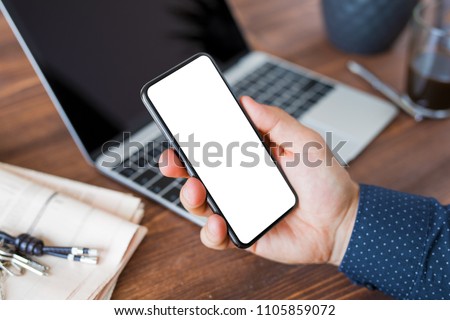 Business man using smartphone. Mobile phone screen mockup.