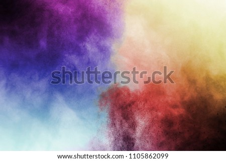 Abstract bright colorful powder on white background,Freeze motion of color powder explosion and multicolored glitter texture, Multicolor clouds. abstract color powder splatted on white background.