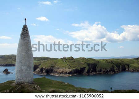 Baltimore Beacon lighthouse overlooking Sherkin Island, west Cork