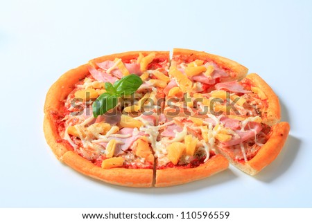 Pineapple and ham pizza on a white background