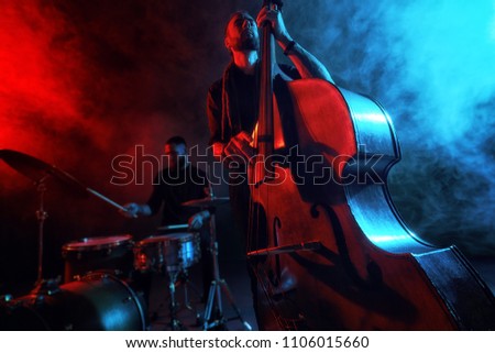 Jazz band performs at the club Royalty-Free Stock Photo #1106015660