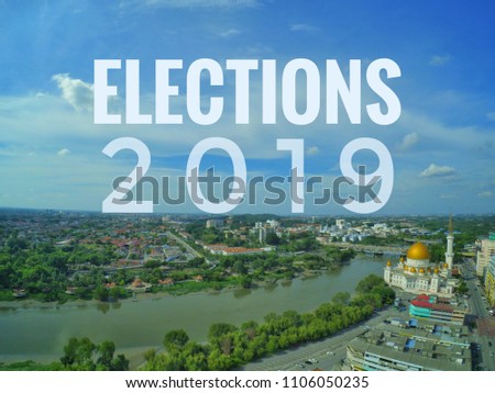 The word ELECTIONS 2019 on background of river near the city. Aerial view.