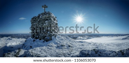 Stone pile monument in Aurdal, Norway. Winter landscape sunny day. High resolution, 57 megapixels. Royalty-Free Stock Photo #1106053070