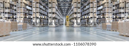 Huge distribution warehouse with high shelves and loaders. Bottom view. Royalty-Free Stock Photo #1106078390