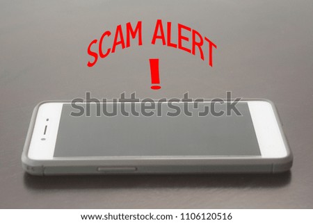 Mobile phone with word scam alert!