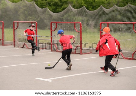Kids ice hockey. Training of young hockey players.