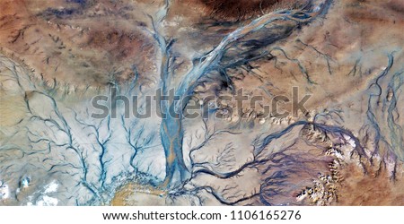 the veins of the earth, abstract photography of the deserts of Africa from the air. aerial view of desert landscapes, Genre: Abstract Naturalism, from the abstract to the figurative,contemporary photo
