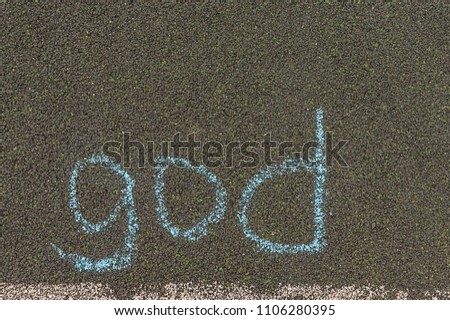 chalk inscription, to God, the inscription on the pavement in large letters