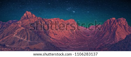 Amazing sunrise at Sinai Mountain, beautiful dawn in Egypt, Moses mountain panorama Royalty-Free Stock Photo #1106283137