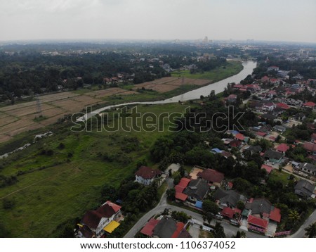 Aerial view of paddy field and residential area in one of the developing area in Kota Bharu, Kelantan.