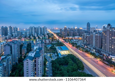 light trails on the street at dusk in guangdong,China 