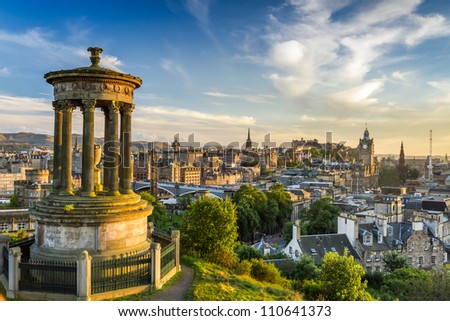 View of the castle from Calton Hill at sunset Royalty-Free Stock Photo #110641373