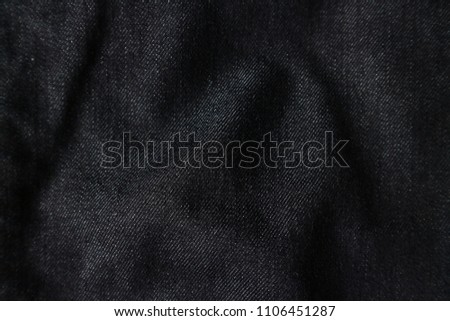 Black denim texture background