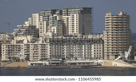 4K Aerial view of modern building block in Malta, waterfront residential area icon