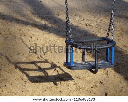 Swing-chair in a playground
