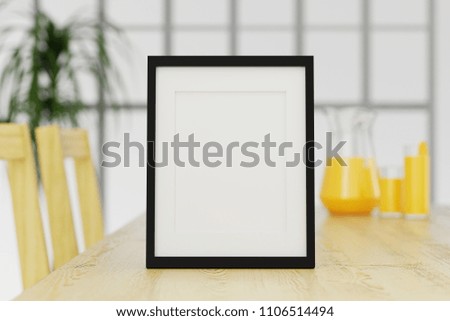 Blank picture frame template for place image or text inside on the wood table.