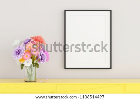 Blank picture framefor place image or text inside hanging on the wall in livingroom
