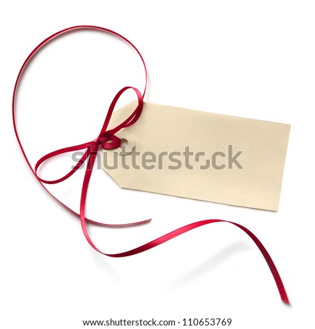 Blank gift tag with a red ribbon bow, isolated on white.