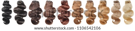 Multiple colors of clip in body wave human hair extensions collection Royalty-Free Stock Photo #1106542106