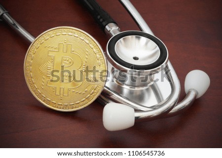 Bitcoin coin with stethoscope