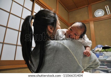 asian newborn baby and mother 