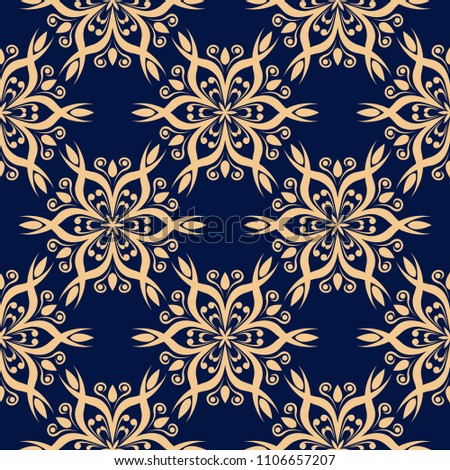 Golden flowers on blue background. Seamless pattern for textile and wallpapers