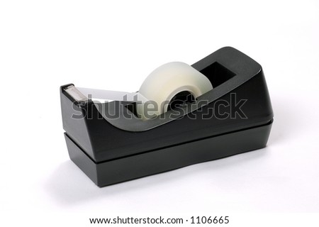 A typical tape dispenser on a white surface Royalty-Free Stock Photo #1106665