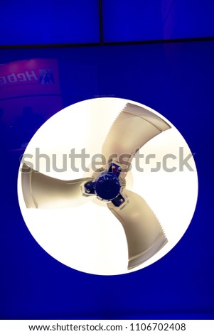 A propeller, a type of fan that transmits power by converting rotational motion into thrust