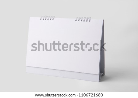 Blank paper spiral calendar for mockup template advertising and branding background.  