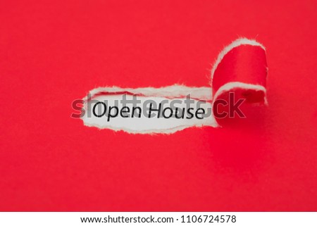 Torn red paper revealing the word of open house concept.