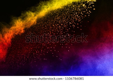  Multicolor powder explosion on black background. Paint Holi.Colored cloud. Colorful dust explode. 