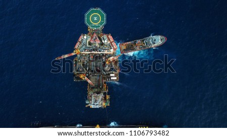 Aerial view of a offshore platform. Also known as an oil platform or offshore drilling rig is facilities to explore and process petroleum and natural gas. Royalty-Free Stock Photo #1106793482