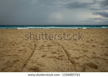 footprints and traces on the beach