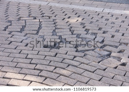 Driveway concrete pavement stones Association is moved with wide joints