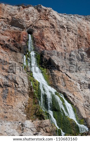 cascade from inside the rock