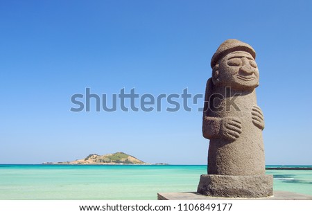 Stone Grandfather and beautiful sea scenery - Jeju Island, Korea Royalty-Free Stock Photo #1106849177