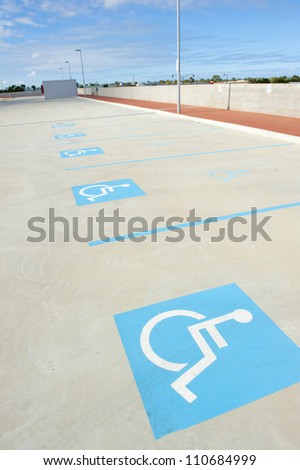 Empty parking bays for disabled people.