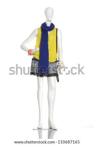 full-length female clothing with blue scarf on mannequin