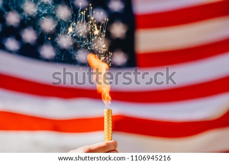 fireworks against the background of the American flag in honor of America's Independence Day
