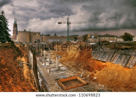 High dynamic range construction site with cranes Royalty-Free Stock Photo #110698823